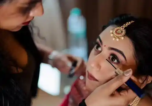 Luxury bridal makeup artist with editorial couture look and premium international product kit