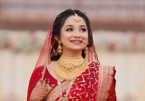 Luxury bridal wear designer with editorial couture lehenga and premium hand-embroidered gown styling