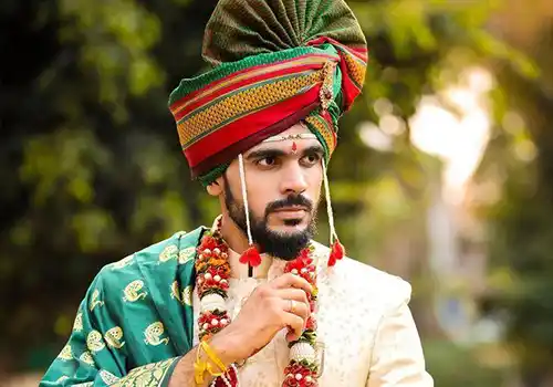 Maharashtrian Indian groom wear designer with traditional veshti dhoti silk set and angavastram styling