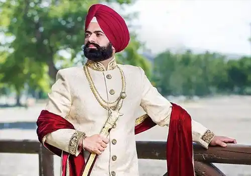 Luxury groom wear designer with editorial couture sherwani and premium bespoke suit styling