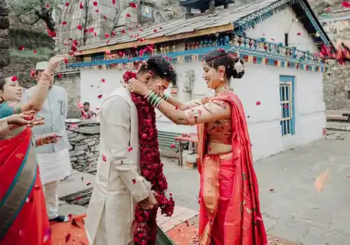 Documentary wedding photographer with natural light storytelling and fine art albums